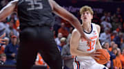 Nov 23, 2024; Champaign, Illinois, USA;  Illinois Fighting Illini guard Kasparas Jakucionis (32) shoots the ball during the first half against the Maryland-Eastern Shore Hawks at State Farm Center. Mandatory Credit: Ron Johnson-Imagn Images