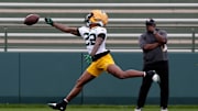 Green Bay Packers wide receiver Matthew Golden (22) misses the ball during the team's first day of minicamp on June 10, 2025, at Ray Nitschke Field in Ashwaubenon, Wis.