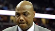Former NBA player and current television personality Charles Barkley walks off the court after watching the New York Knicks defeat the Cleveland Cavaliers.