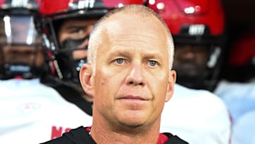 Sep 11, 2025; Winston-Salem, North Carolina, USA;  North Carolina State Wolfpack head coach Dave Doeren walks his team out on the field against the Wake Forest Demon Deacons at Allegacy Federal Credit Union Stadium. Mandatory Credit: Luke Jamroz-Imagn Images