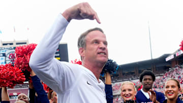 Ole Miss coach Lane Kiffin celebrates after a win