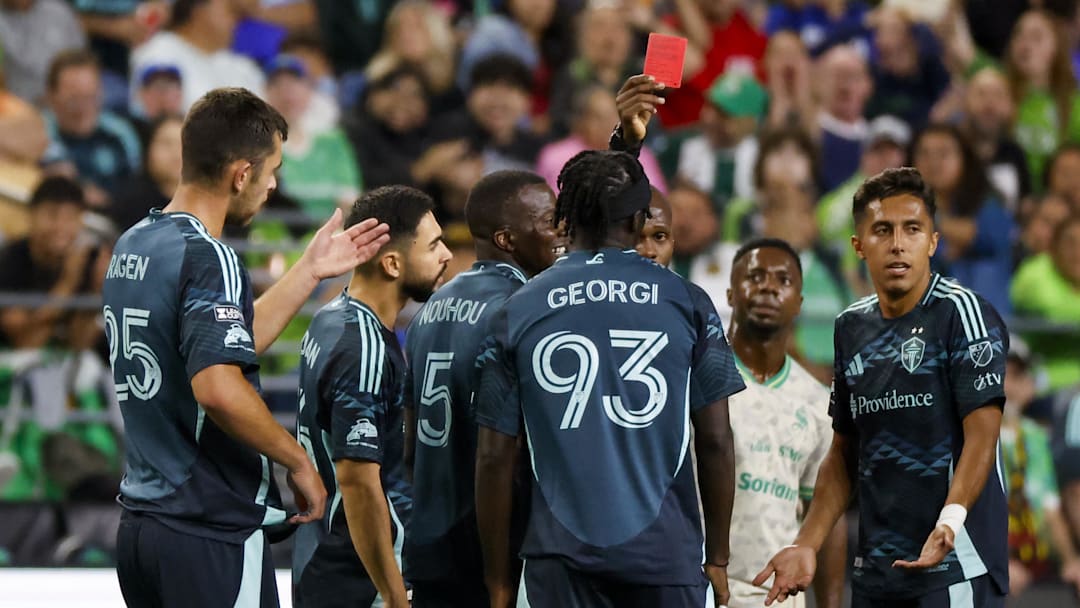 Aug 3, 2025; Seattle, WA, USA; Seattle Sounders FC forward Georgi Minoungou (93) receives a red card following a second yellow card for unsportsmanlike celebration for a goal against Santos Laguna during the second half at Lumen Field. Mandatory Credit: Joe Nicholson-Imagn Images