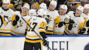Apr 3, 2025; St. Louis, Missouri, USA;  Pittsburgh Penguins right wing Bryan Rust (17) is congratulated by teammates after scoring against the St. Louis Blues during the first period at Enterprise Center. Mandatory Credit: Jeff Curry-Imagn Images