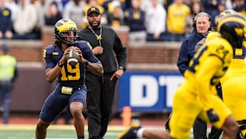 Michigan head coach Sherrone Moore watches quarterback Bryce Underwood (19) during the first half of the spring game at Michigan Stadium in Ann Arbor on Saturday, April 19, 2025.