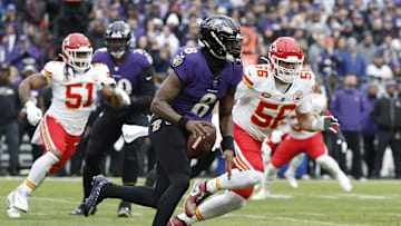 Jan 28, 2024; Baltimore, Maryland, USA; Baltimore Ravens quarterback Lamar Jackson (8) runs with the ball during the first quarter in the AFC Championship football game against the Kansas City Chiefs at M&T Bank Stadium. Mandatory Credit: Geoff Burke-Imagn Images