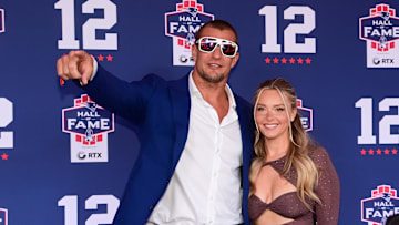 Jun 12, 2024; Foxborough, MA, USA; Retired NFL tight end Rob Gronkowski poses for photos with his girlfriend Camille Kostek during the New England Patriots Hall of Fame induction Ceremony for Tom Brady Mandatory Credit: Eric Canha-Imagn Images