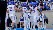 Boise State players celebrate a touchdown.