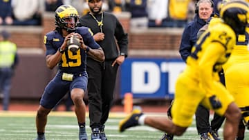 Michigan head coach Sherrone Moore watches quarterback Bryce Underwood (19) during the first half of the spring game at Michigan Stadium in Ann Arbor on Saturday, April 19, 2025.