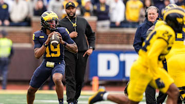 Michigan head coach Sherrone Moore watches quarterback Bryce Underwood (19) during the first half of the spring game at Michigan Stadium in Ann Arbor on Saturday, April 19, 2025.