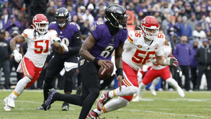 Jan 28, 2024; Baltimore, Maryland, USA; Baltimore Ravens quarterback Lamar Jackson (8) runs with the ball during the first quarter in the AFC Championship football game against the Kansas City Chiefs at M&T Bank Stadium. Mandatory Credit: Geoff Burke-USA TODAY Sports