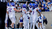 Sep 20, 2025; Colorado Springs, Colorado, USA; Boise State Broncos tight end Matt Lauter (85) celebrates his touchdown with quarterback Maddux Madsen (4) and wide receiver Latrell Caples (3) in the second quarter against the Air Force Falcons at Falcon Stadium. Mandatory Credit: Isaiah J. Downing-Imagn Images