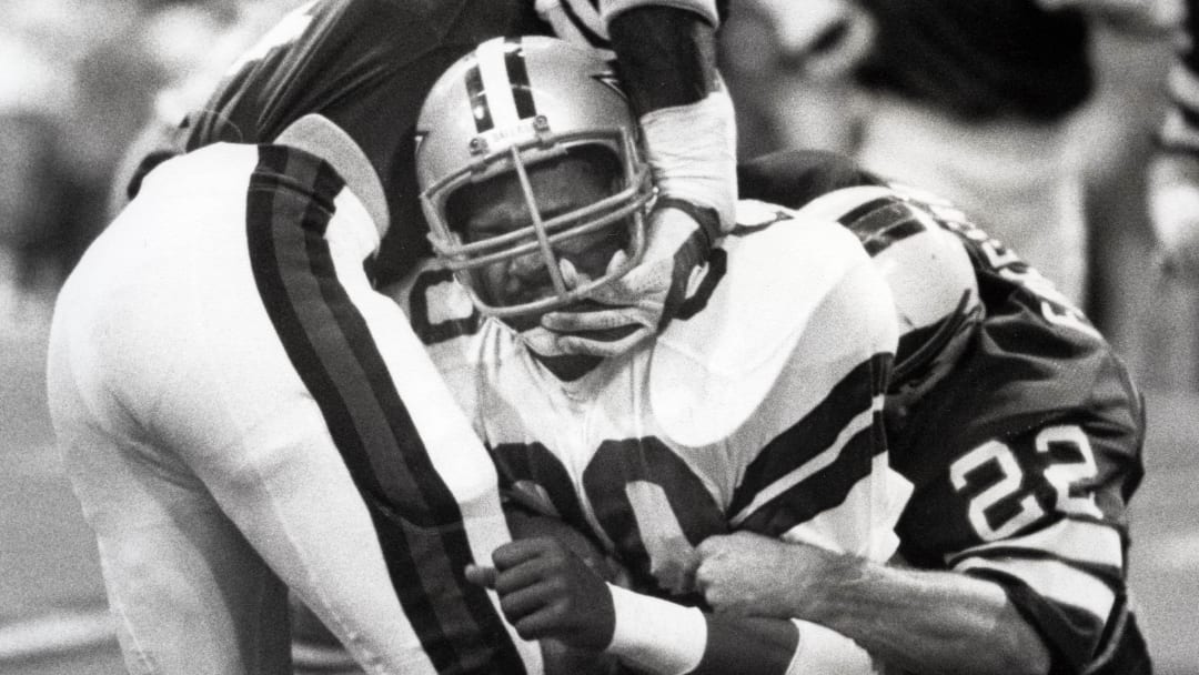 Nov 9, 1981, Dallas, TX, USA; FILE PHOTO; Dallas Cowboys wide receiver Tony Hill in action against Buffalo Bills defenders Ervin Parker (62) and Steve Freeman (22) at Cowboy Stadium. Mandatory Credit: Darryl Norenberg-USA TODAY Sports