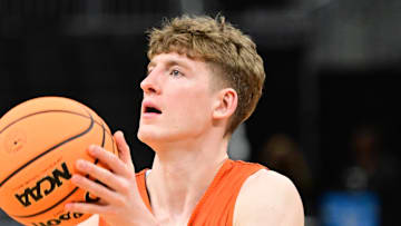 Mar 20, 2025; Milwaukee, WI, USA; Illinois Fighting Illini guard Kasparas Jakucionis (32) shoots the ball during NCAA Tournament First Round Practice at Fiserv Forum. Mandatory Credit: Benny Sieu-Imagn Images