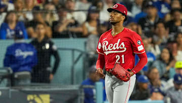 Cincinnati Reds starting pitcher Hunter Greene (21) reacts on the mound in the third inning of the MLB National League Wild Card Game 1 between the Los Angeles Dodgers and the Cincinnati Reds at Dodger Stadium in Los Angeles on Tuesday, Sept. 30, 2025. The Dodgers won game 1 of the series, 10-5.