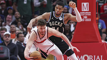 Feb 25, 2025; Houston, Texas, USA; Milwaukee Bucks forward Giannis Antetokounmpo (34) defends against Houston Rockets center Alperen Sengun (28) during the fourth quarter at Toyota Center. Mandatory Credit: Troy Taormina-Imagn Images