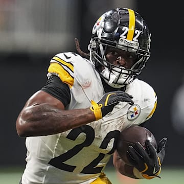 Sep 8, 2024; Atlanta, Georgia, USA; Pittsburgh Steelers running back Najee Harris (22) runs with the ball against the Atlanta Falcons at Mercedes-Benz Stadium. Mandatory Credit: Dale Zanine-Imagn Images