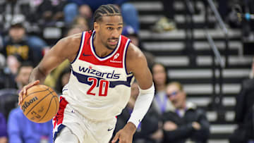 Mar 19, 2025; Salt Lake City, Utah, USA;  Washington Wizards center Alex Sarr (20) make a breakaway against the Utah Jazz during the first half at the Delta Center. Mandatory Credit: Peter Creveling-Imagn Images