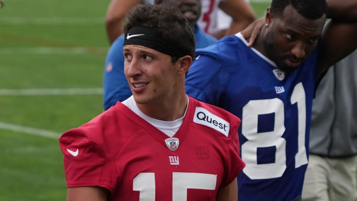 East Rutherford, NJ -- June 11, 2024 -- Quarterback Tommy DeVito walks off at the end of practice field at the NY Giants Mandatory Minicamp at their practice facility in East Rutherford, NJ.