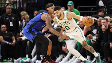 Boston Celtics forward Jayson Tatum (0) is guarded by Orlando Magic forward Paolo Banchero (5) in the second quarter during game four of first round for the 2025 NBA Playoffs at Kia Center.