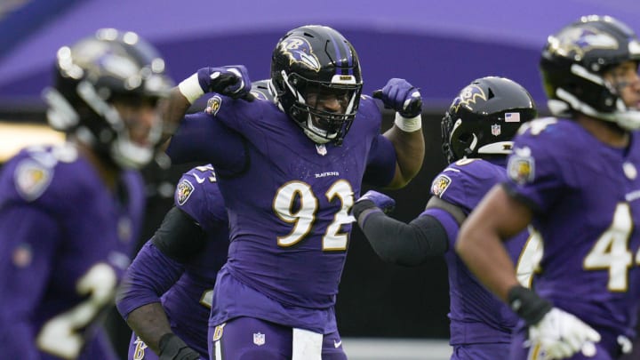 Dec 10, 2023; Baltimore, Maryland, USA;  Baltimore Ravens defensive tackle Justin Madubuike (92) celebrates a sack against the Los Angeles Rams during the first quarter at M&T Bank Stadium. Mandatory Credit: Jessica Rapfogel-USA TODAY Sports