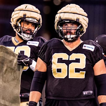 Aug 20, 2024; New Orleans, LA, USA;  New Orleans Saints guard Lucas Patrick (62) looks on during practice at Yulman Stadium (Tulane). Mandatory Credit: Stephen Lew-Imagn Images