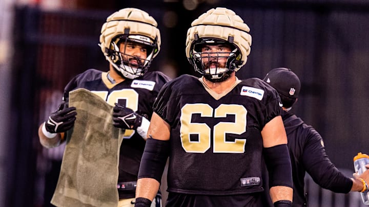 Aug 20, 2024; New Orleans, LA, USA;  New Orleans Saints guard Lucas Patrick (62) looks on during practice at Yulman Stadium (Tulane). Mandatory Credit: Stephen Lew-Imagn Images