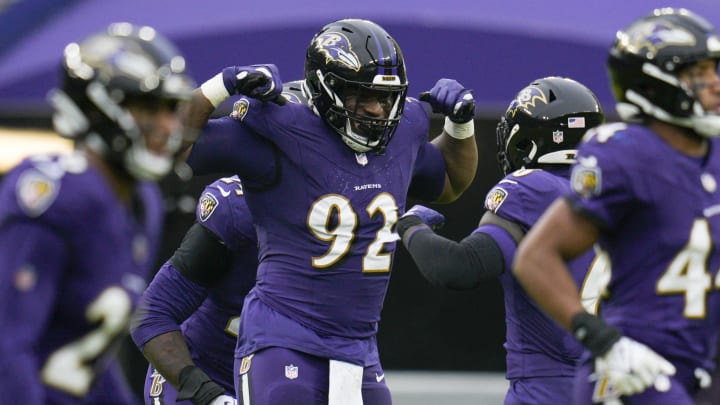 Dec 10, 2023; Baltimore, Maryland, USA;  Baltimore Ravens defensive tackle Justin Madubuike (92) celebrates a sack against the Los Angeles Rams during the first quarter at M&T Bank Stadium. Mandatory Credit: Jessica Rapfogel-USA TODAY Sports