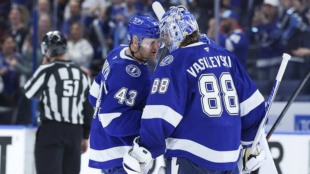Apr 21, 2026; Tampa, Florida, USA; Tampa Bay Lightning defenseman Darren Raddysh (43) and goaltender Andrei Vasilevskiy (88) react after beating the Montreal Canadiens in overtime during game two of the first round of the 2026 Stanley Cup Playoffs at Benchmark International Arena. Mandatory Credit: Nathan Ray Seebeck-Imagn Images