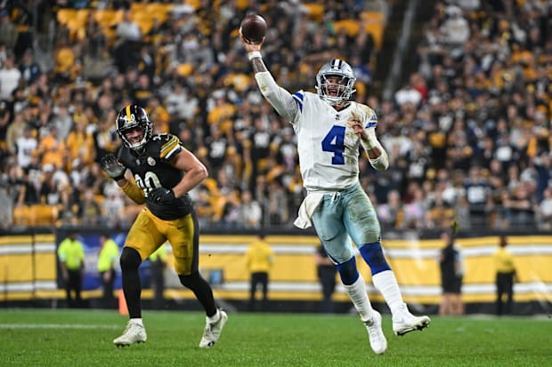 Dallas Cowboys QB Dak Prescott throws a touchdown pass to running back Rico Dowdle.