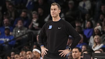 Dec 21, 2024; Atlanta, Georgia, USA; Duke basketball head coach Jon Scheyer on the court against the Georgia Tech Yellow Jackets during the first half at McCamish Pavilion.