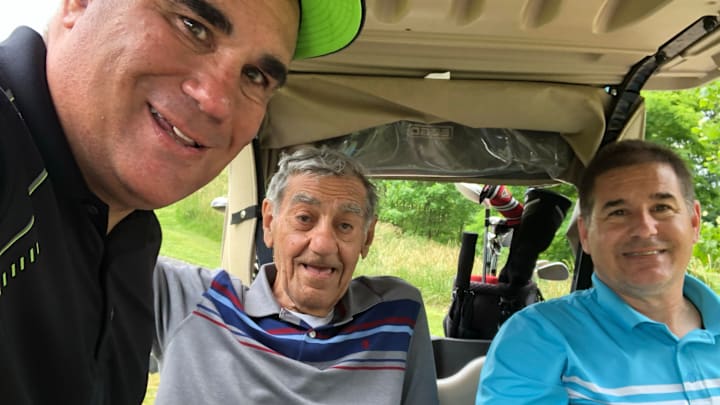 Ernest Adornato Jr. (center) had a love of sports which endured through the final days of his life and he passed the passion on to his sons, Gary (left) and Steve Adornato.