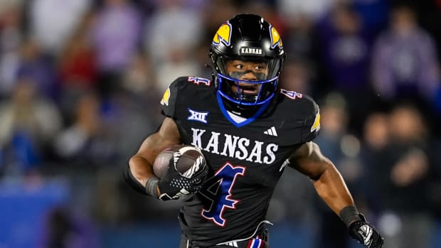  Kansas Jayhawks running back Devin Neal (4) runs the ball. Jay Biggerstaff-USA TODAY Sports