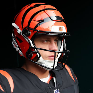 Cincinnati Bengals quarterback Joe Burrow concealed the Nike Swoosh logo on his cleats before an NFL preseason game.