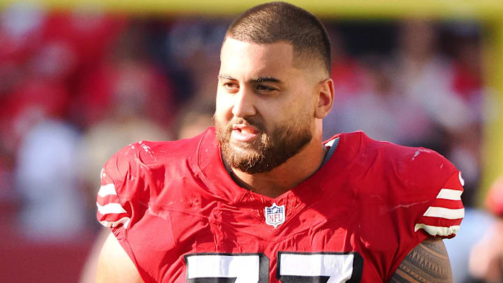 Oct 6, 2024; Santa Clara, California, USA; XSan Francisco 49ers offensive lineman Dominick Puni (77)XXXX after the game against the Arizona Cardinals at Levi's Stadium. Mandatory Credit: Kelley L Cox-Imagn Images