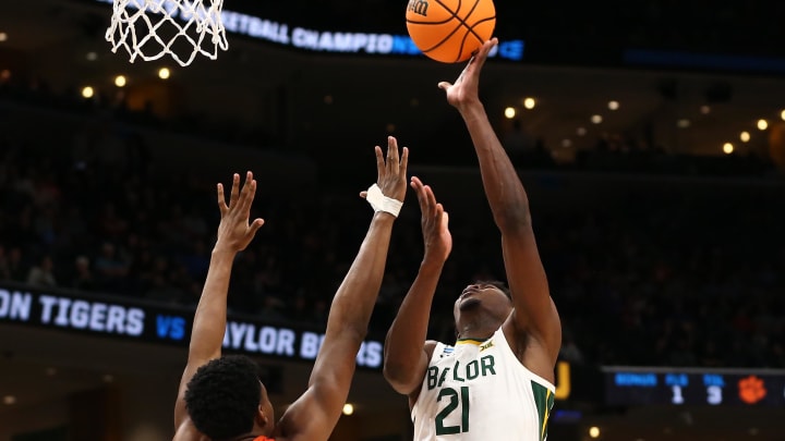 Mar 24, 2024; Memphis, TN, USA; Baylor Bears center Yves Missi (21) shoots against Clemson Tigers forward RJ Godfrey (10) in the second half in the second round of the 2024 NCAA Tournament at FedExForum. Mandatory Credit: Petre Thomas-USA TODAY Sports