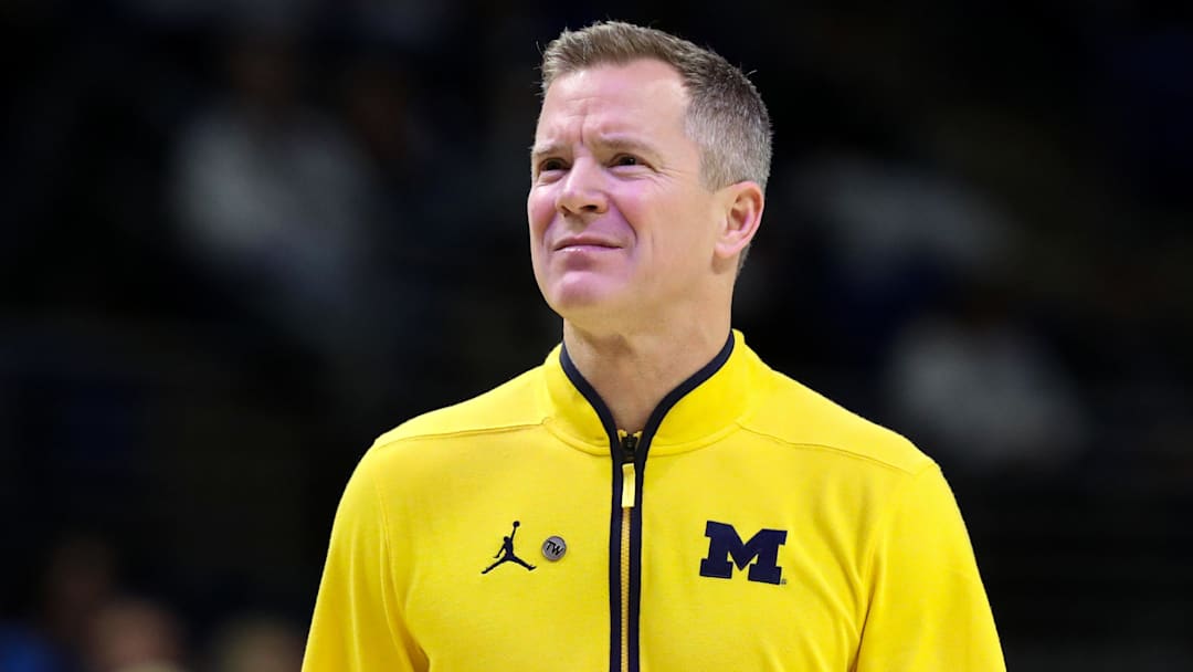 Michigan Wolverines head coach Dusty May looks on from the bench.