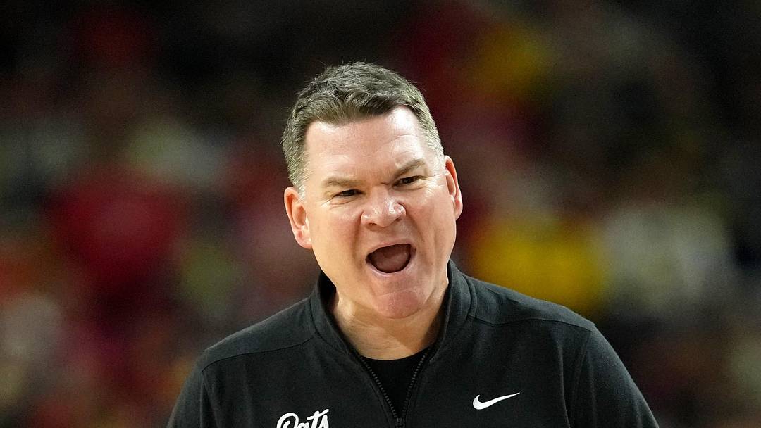 Apr 4, 2026; Indianapolis, IN, USA; Arizona Wildcats head coach Tommy Lloyd reacts during the second half in a semifinal of the Final Four of the men's 2026 NCAA Tournament at Lucas Oil Stadium. Mandatory Credit: Bob Donnan-Imagn Images