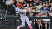 May 14, 2024; Phoenix, Arizona, USA; Cincinnati Reds second baseman Santiago Espinal (4) hits a RBI