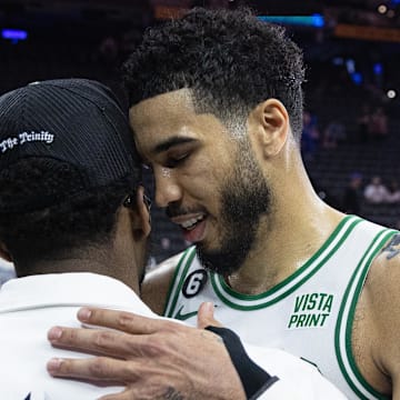 May 11, 2023; Philadelphia, Pennsylvania, USA; Boston Celtics forward Jayson Tatum (0) talks with Cleveland Cavalier Donovan Mitchell after a victory against the Philadelphia 76ers in game six of the 2023 NBA playoffs at Wells Fargo Center. Mandatory Credit: Bill Streicher-Imagn Images