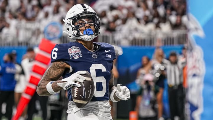 Penn State wide receiver Harrison Wallace III scores a touchdown against Ole Miss in the 2023 Peach Bowl. 