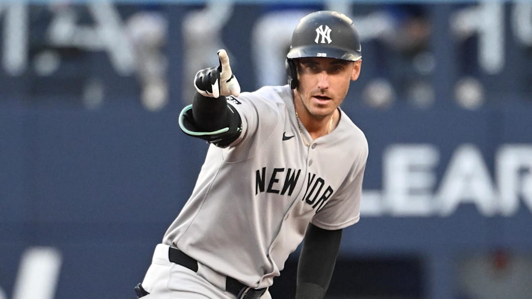 Jul 22, 2025; Toronto, Ontario, CAN;   New York Yankees left fielder Cody Bellinger (35) reacts after hitting a double against the Toronto Blue Jays in the third inning at Rogers Centre. Mandatory Credit: Dan Hamilton-Imagn Images
