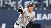 Jul 22, 2025; Toronto, Ontario, CAN;   New York Yankees left fielder Cody Bellinger (35) reacts after hitting a double against the Toronto Blue Jays in the third inning at Rogers Centre. Mandatory Credit: Dan Hamilton-Imagn Images