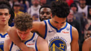 Jan 24, 2024; San Francisco, California, USA; Golden State Warriors guard Brandin Podziemski (2) and forward Trayce Jackson-Davis (32) before a game against the Atlanta Hawks at Chase Center. Mandatory Credit: Kelley L Cox-USA TODAY Sports