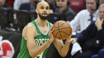 May 11, 2024; Cleveland, Ohio, USA; Boston Celtics guard Derrick White (9) controls the ball against