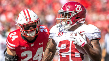 Alabama running back Jam Miller (26) runs a touchdown from Wisconsin Hunter Wohler during the game at Camp Randall Stadium in Madison, Wis. on Saturday, September 14, 2024.