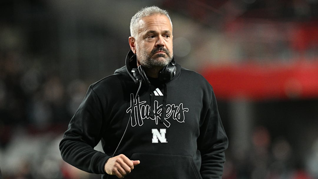 Matt Rhule runs off the field after Nebraska's Blackout loss