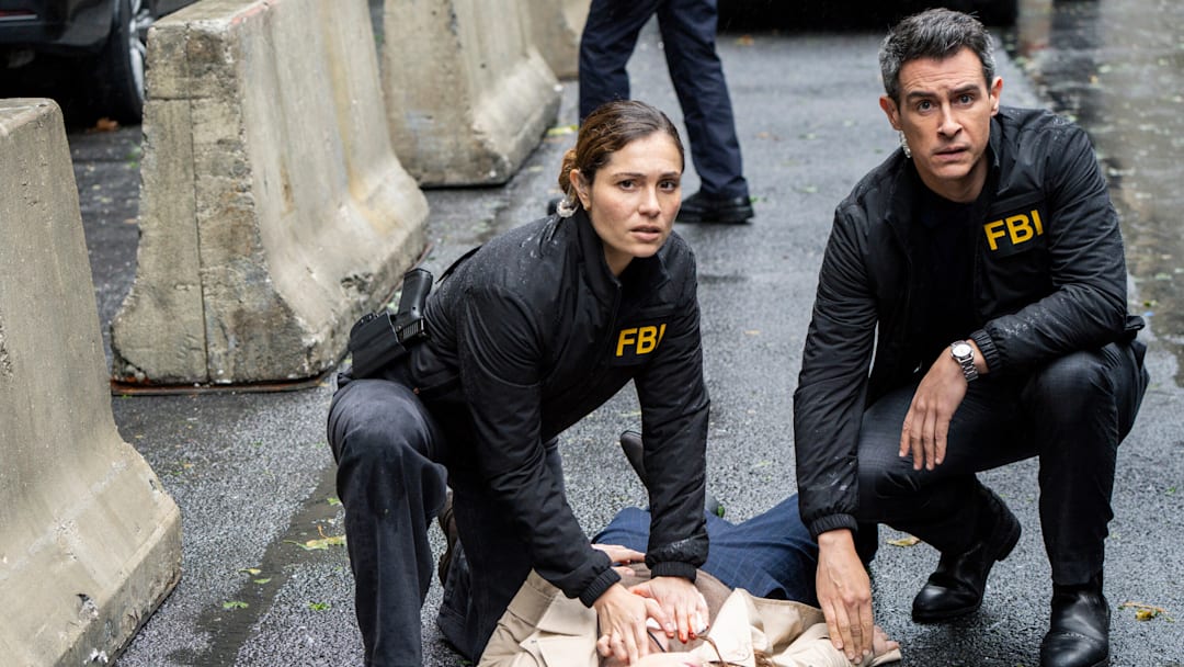 “Ratlined” – Pictured (L-R): Juliana Aidén Martinez as Eva Ramos and John Boyd as Special Agent Stuart Scola. Photo: Bennett Raglin/CBS ©2025 CBS Broadcasting, Inc. All Rights Reserved. “Ratlined” – Pictured (L-R): Juliana Aidén Martinez as Eva Ramos and John Boyd as Special Agent Stuart Scola. Photo: Bennett Raglin/CBS ©2025 CBS Broadcasting, Inc. All Rights Reserved.