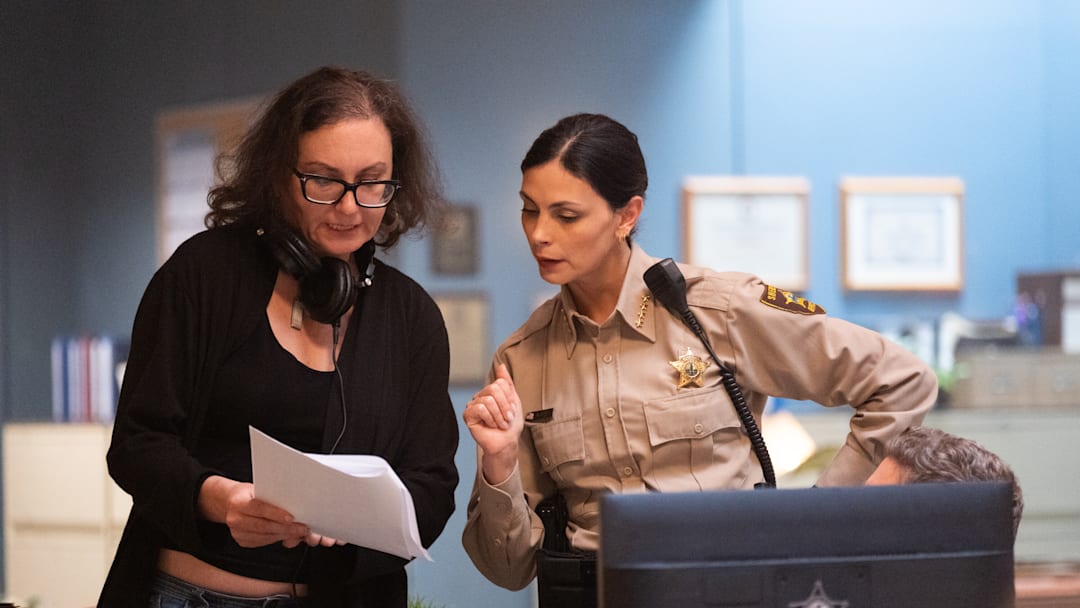 "Pilot" - Sheriff Country. PIctured: Script Supervisor Jeannine Dupuy and Morena Baccarin. Photo: Brooke Palmer/CBS ©2025 CBS Broadcasting, Inc. All Rights Reserved.