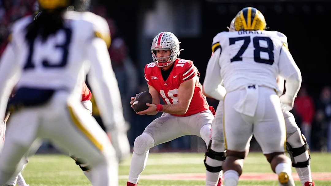 Ohio State Buckeyes quarterback Will Howard (18) takes a snap during the second half of the NCAA football game against the Michigan Wolverines at Ohio Stadium in Columbus on Saturday, Nov. 30, 2024. Michigan won 13-10.