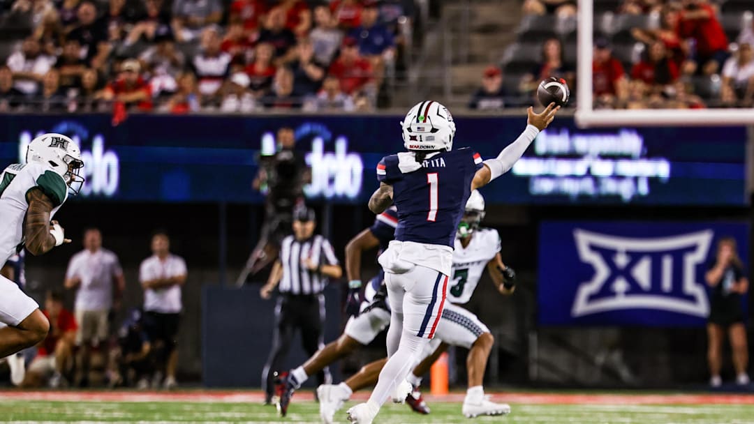 Aug 30, 2025; Tucson, Arizona, USA; Arizona Wildcats quarterback Noah Fifita (1) passes the ball during the first quarter of the game against the Hawaii Rainbow Warriors at Arizona Stadium. Mandatory Credit: Aryanna Frank-Imagn Images